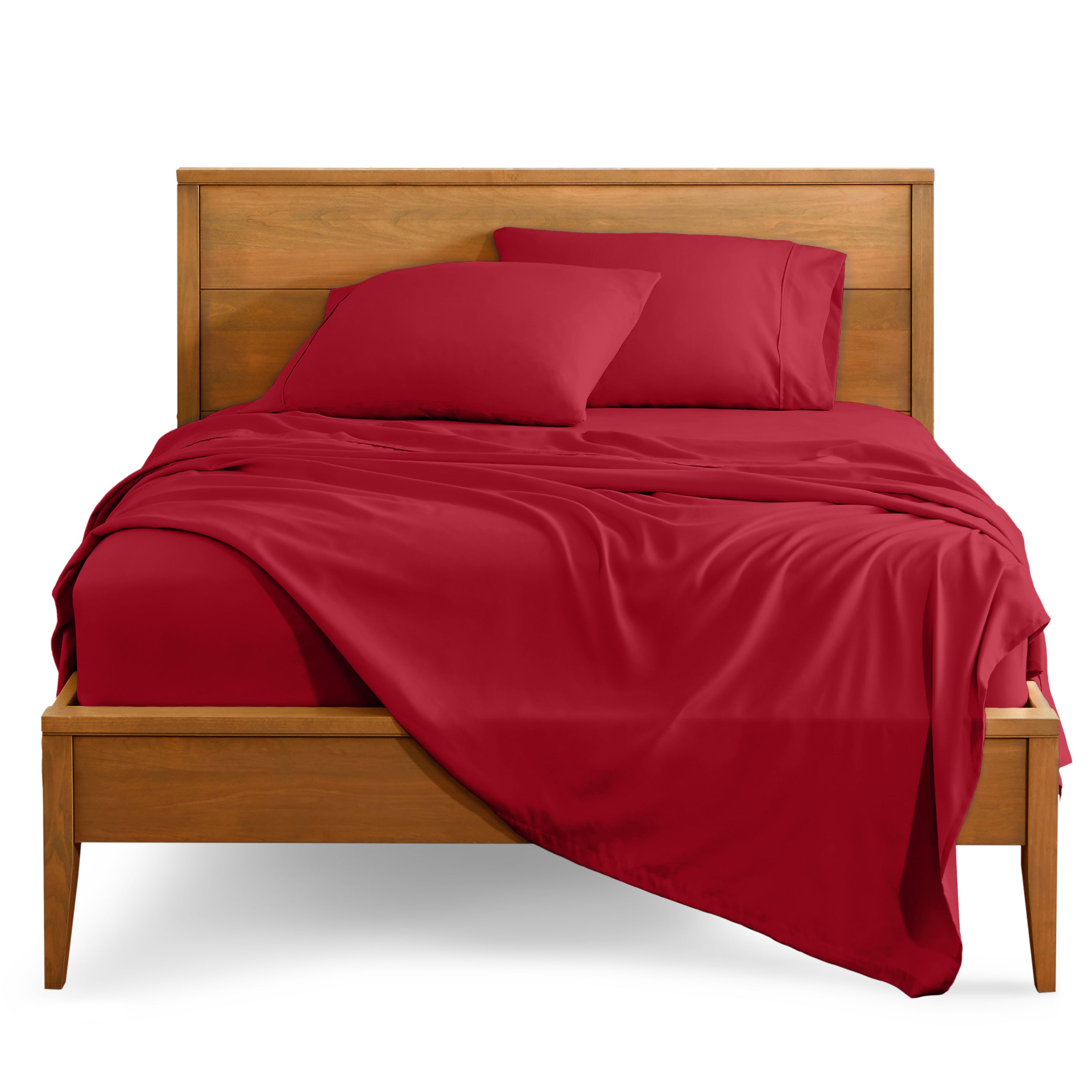 Microfiber sheet set on a bed with a wooden bed frame
