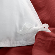 Close up of cloth ties for attaching duvet insert to inside of duvet cover