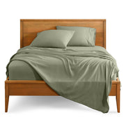 Microfiber sheet set on a bed with a wooden bed frame