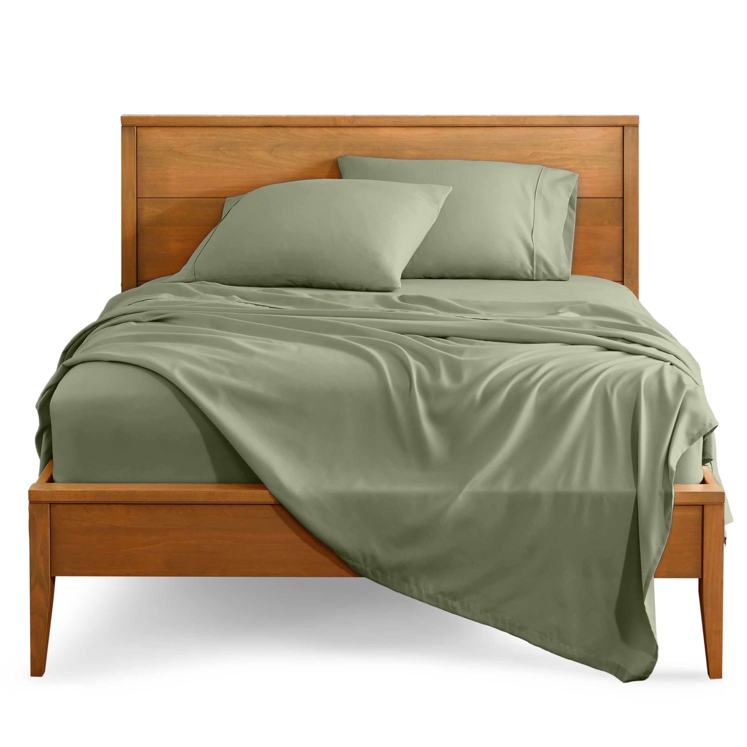Microfiber sheet set on a bed with a wooden bed frame