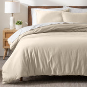 A modern bed with a flannel duvet cover set consisting of the duvet cover and two pillows.