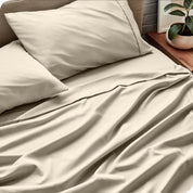 Close up of microfiber extra deep pocket sheets on a mattress