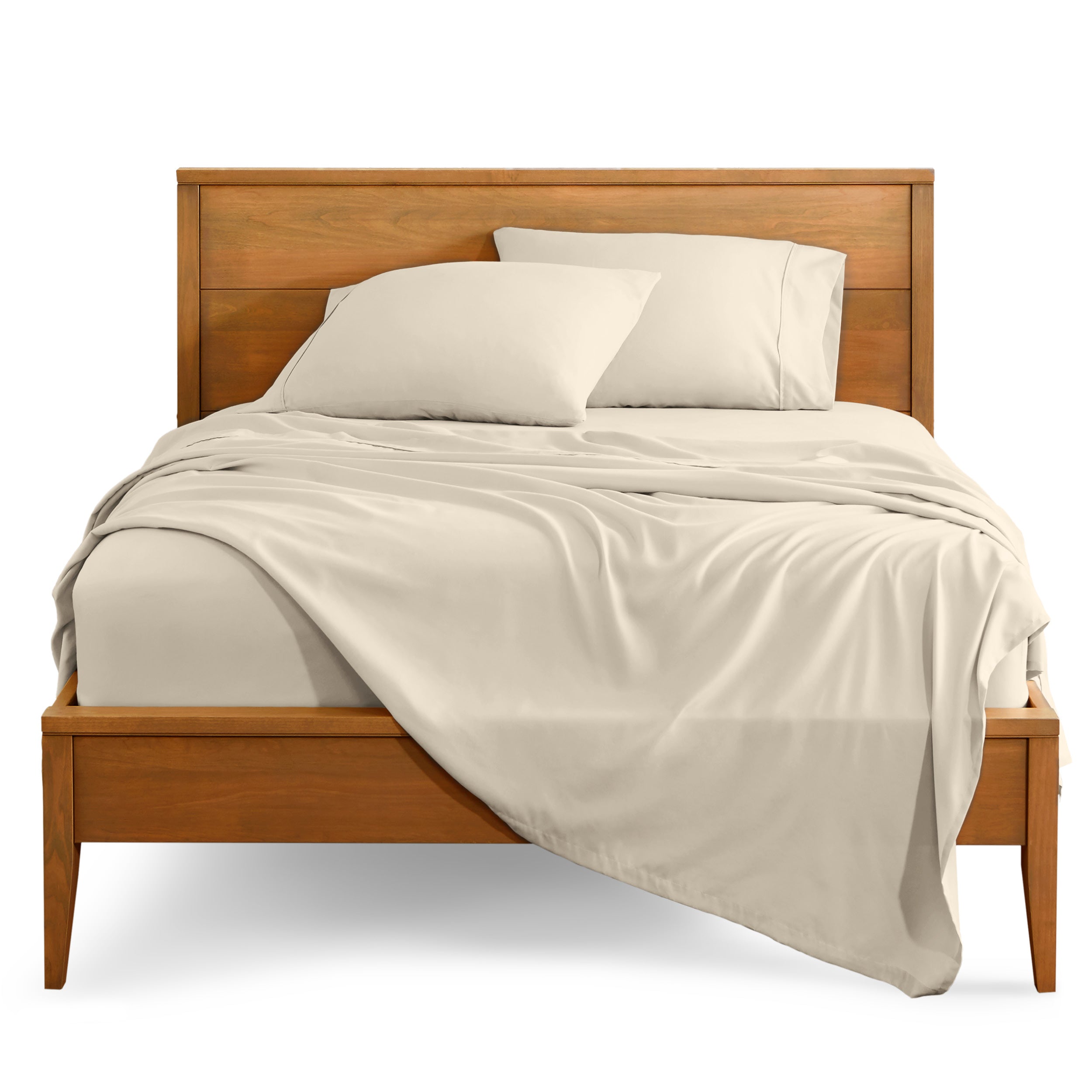 Microfiber sheet set on a bed with a wooden bed frame