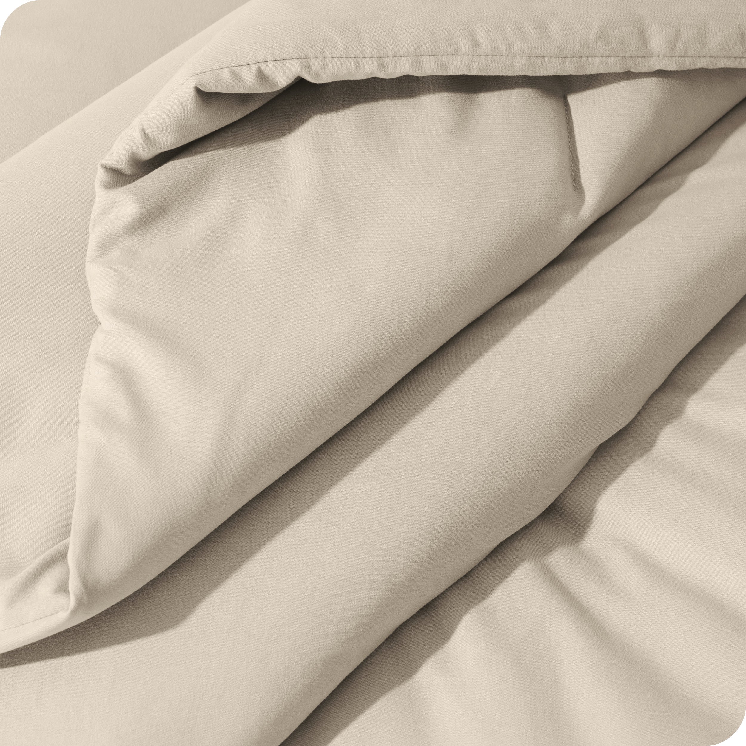 A close up of a track stitch comforter