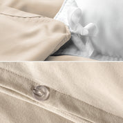 The corner ties of a duvet cover attached to a duvet insert