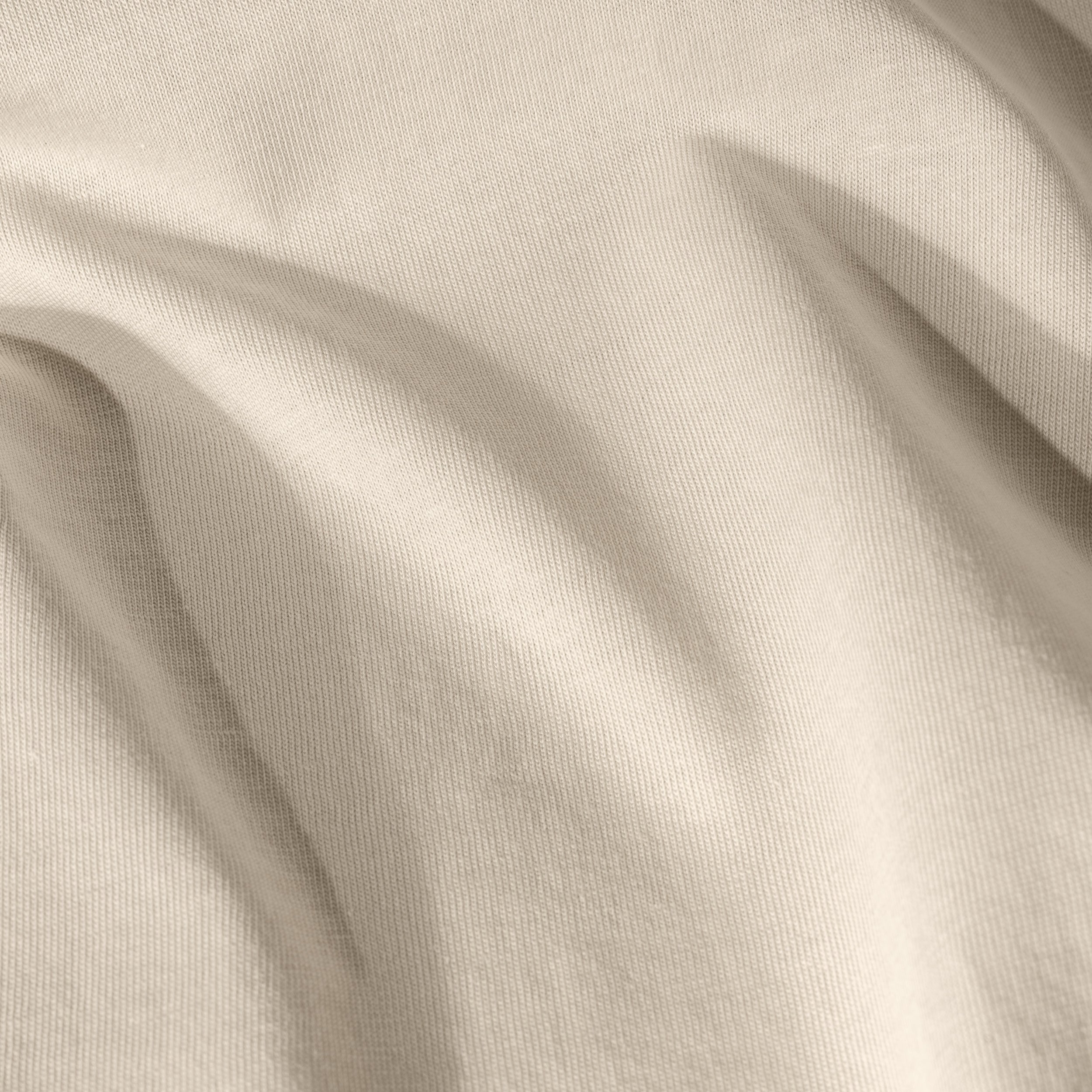 A close up view of the organic cotton jersey sheet sets' fabric and color.