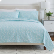 A bed made with cotton flannel sheets