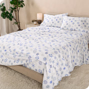 A bed made with cotton flannel sheets
