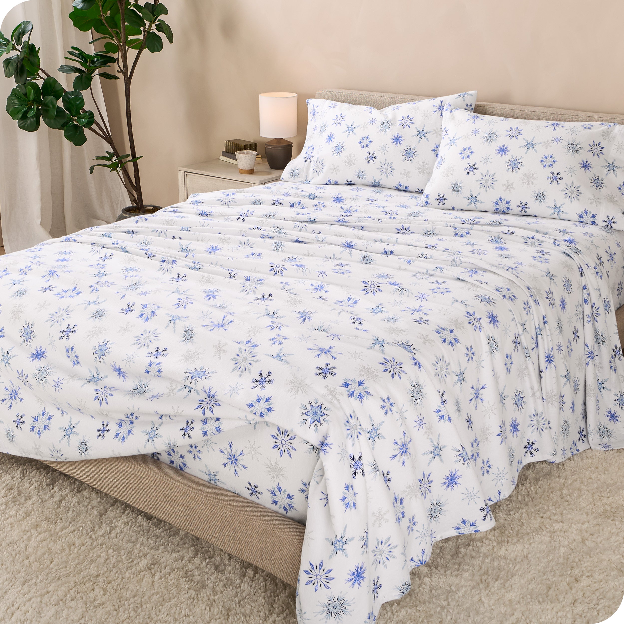 A bed made with cotton flannel sheets