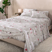 A bed made with cotton flannel sheets