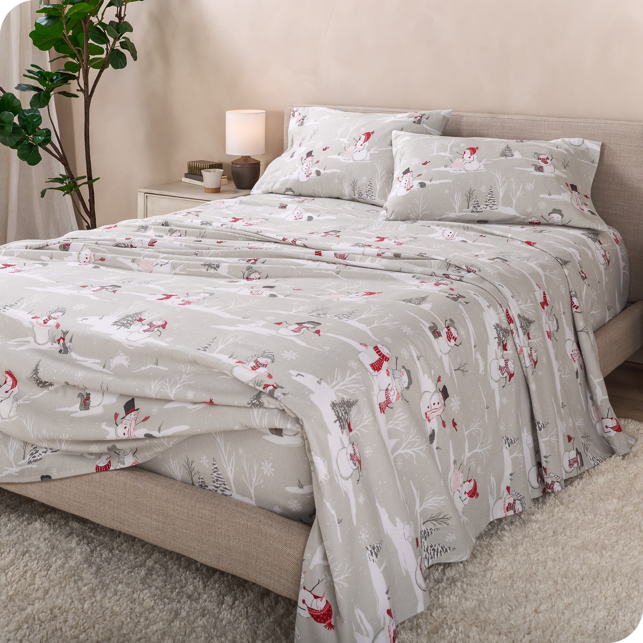 A bed made with cotton flannel sheets