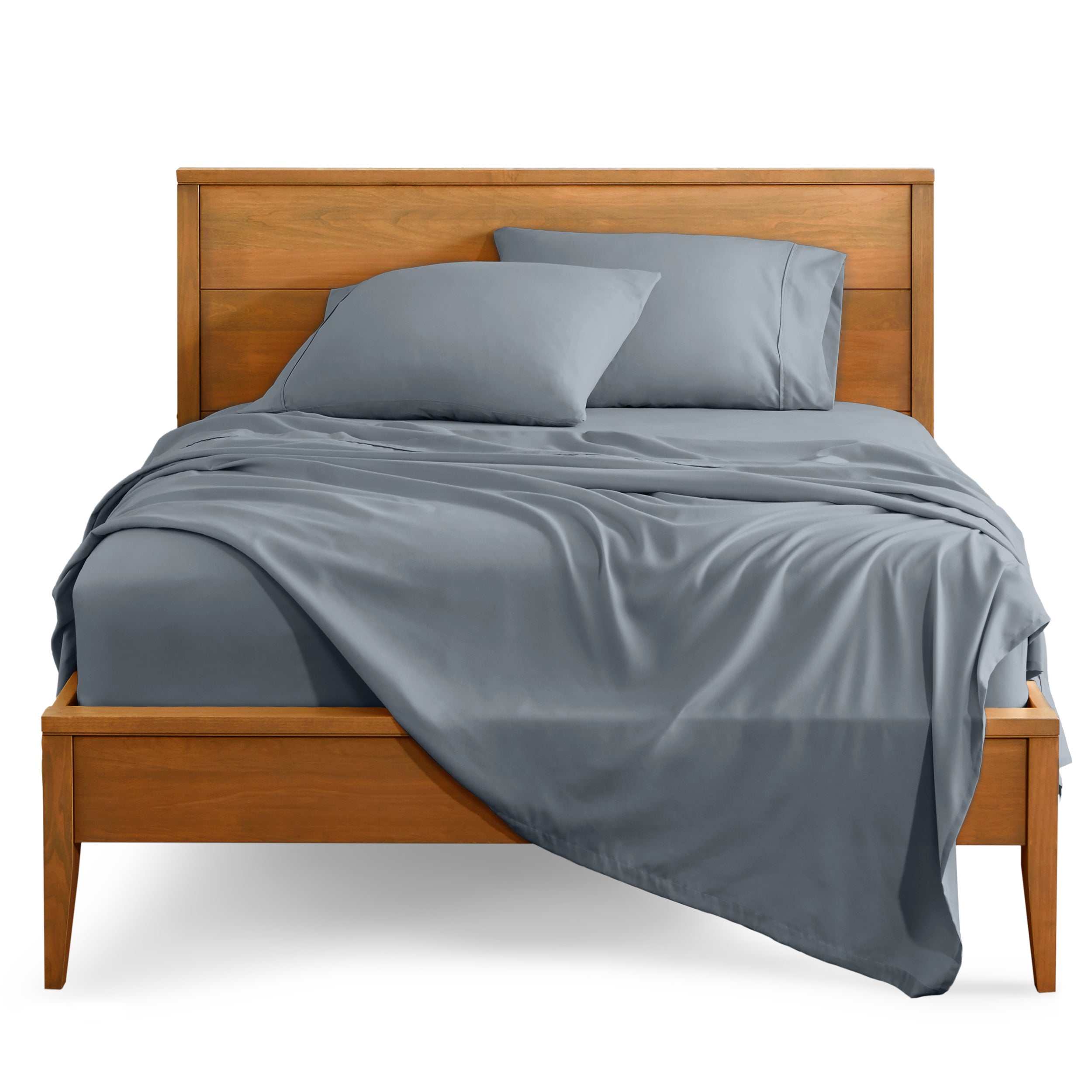 Microfiber sheet set on a bed with a wooden bed frame