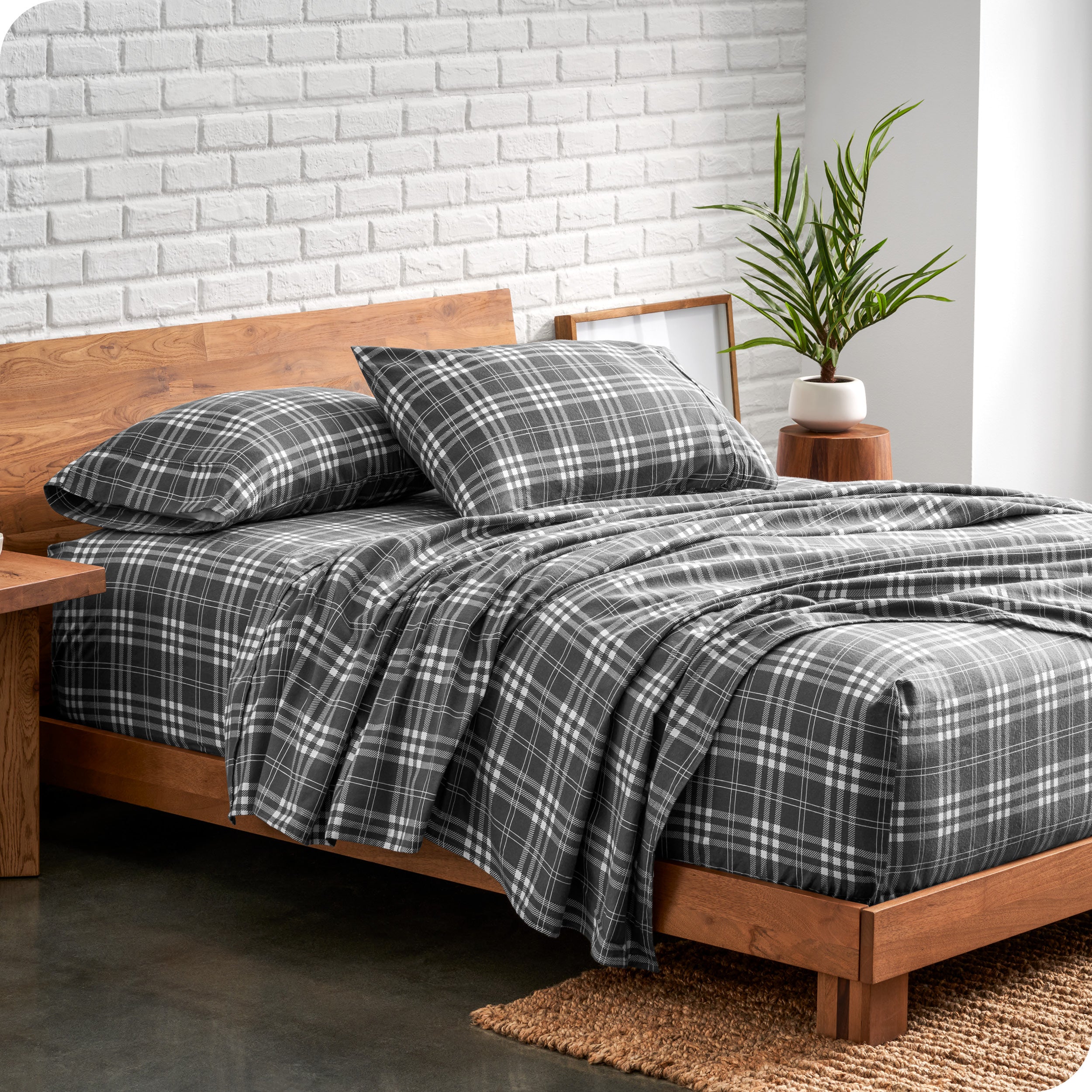Plaid flannel sheets on a bed