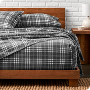 A bed made with cotton flannel sheets