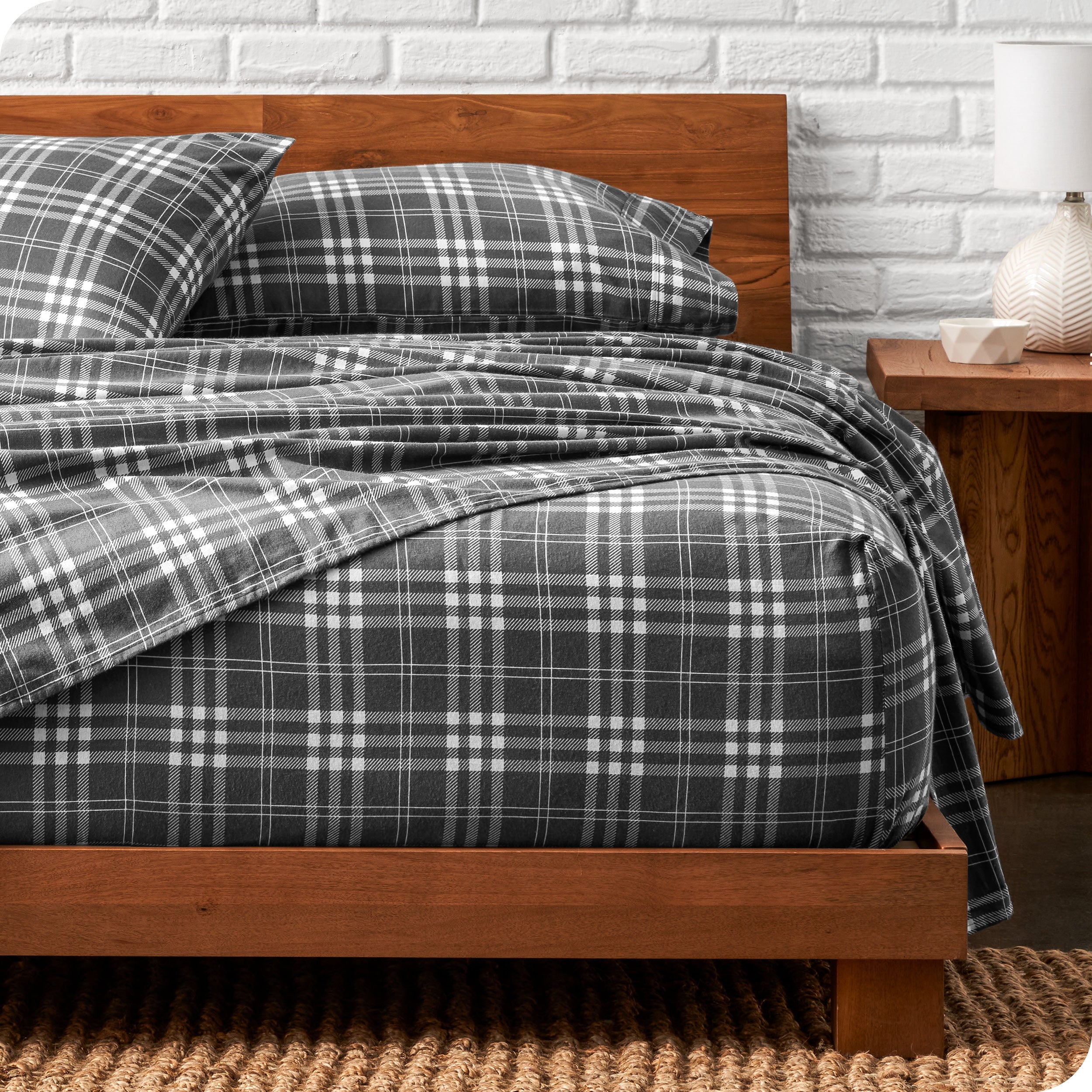 A bed made with cotton flannel sheets