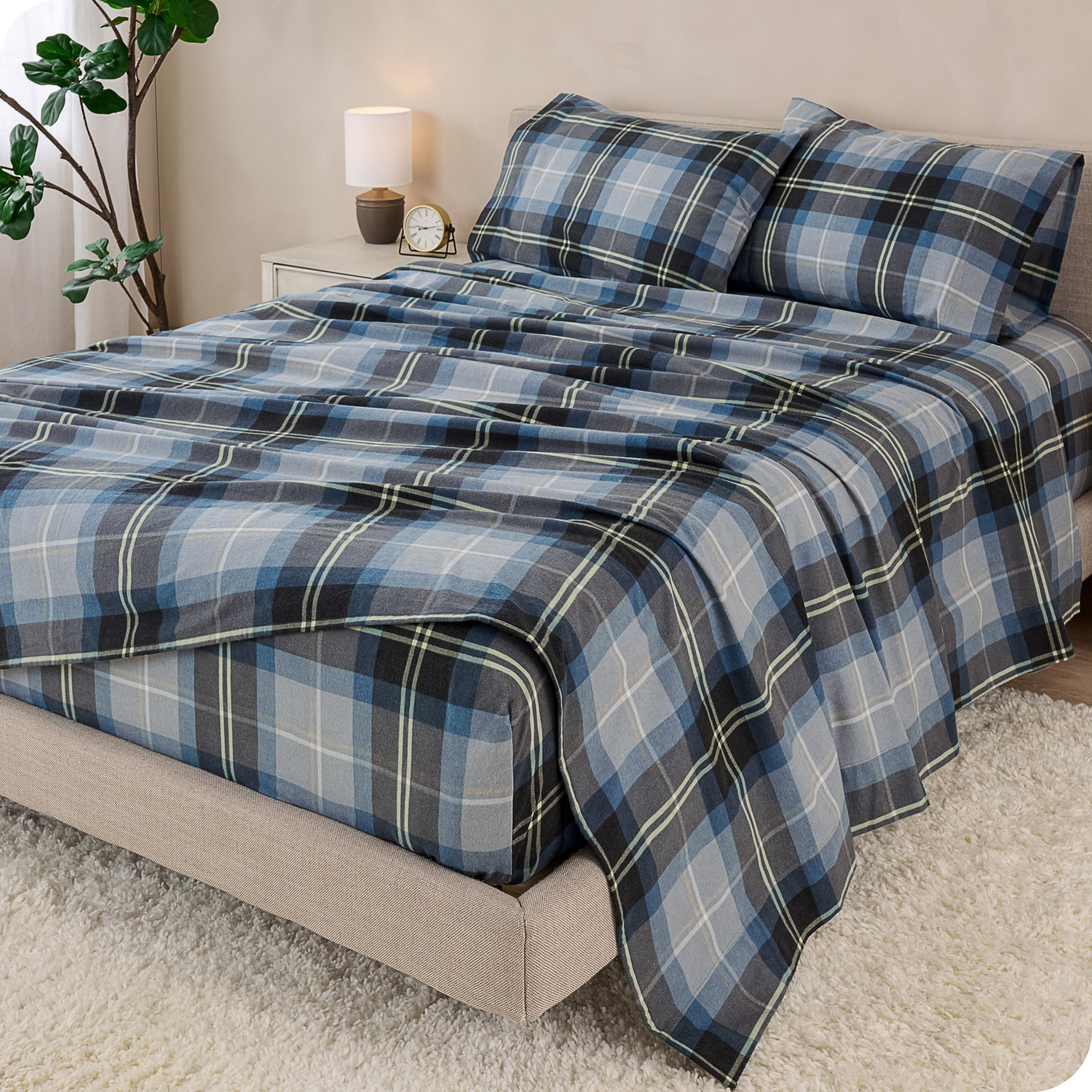 A bed made with cotton flannel sheets