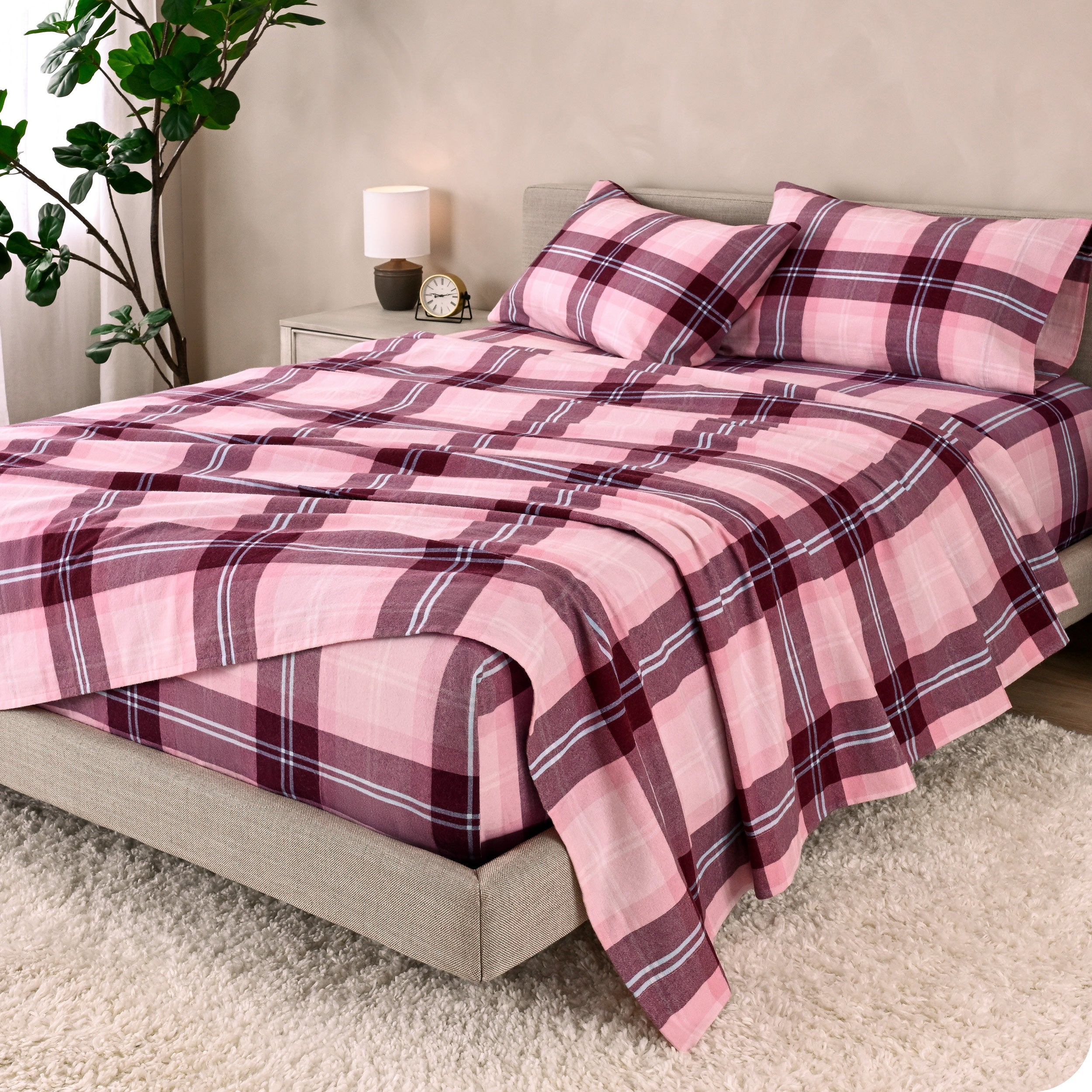 A bed made with cotton flannel sheets