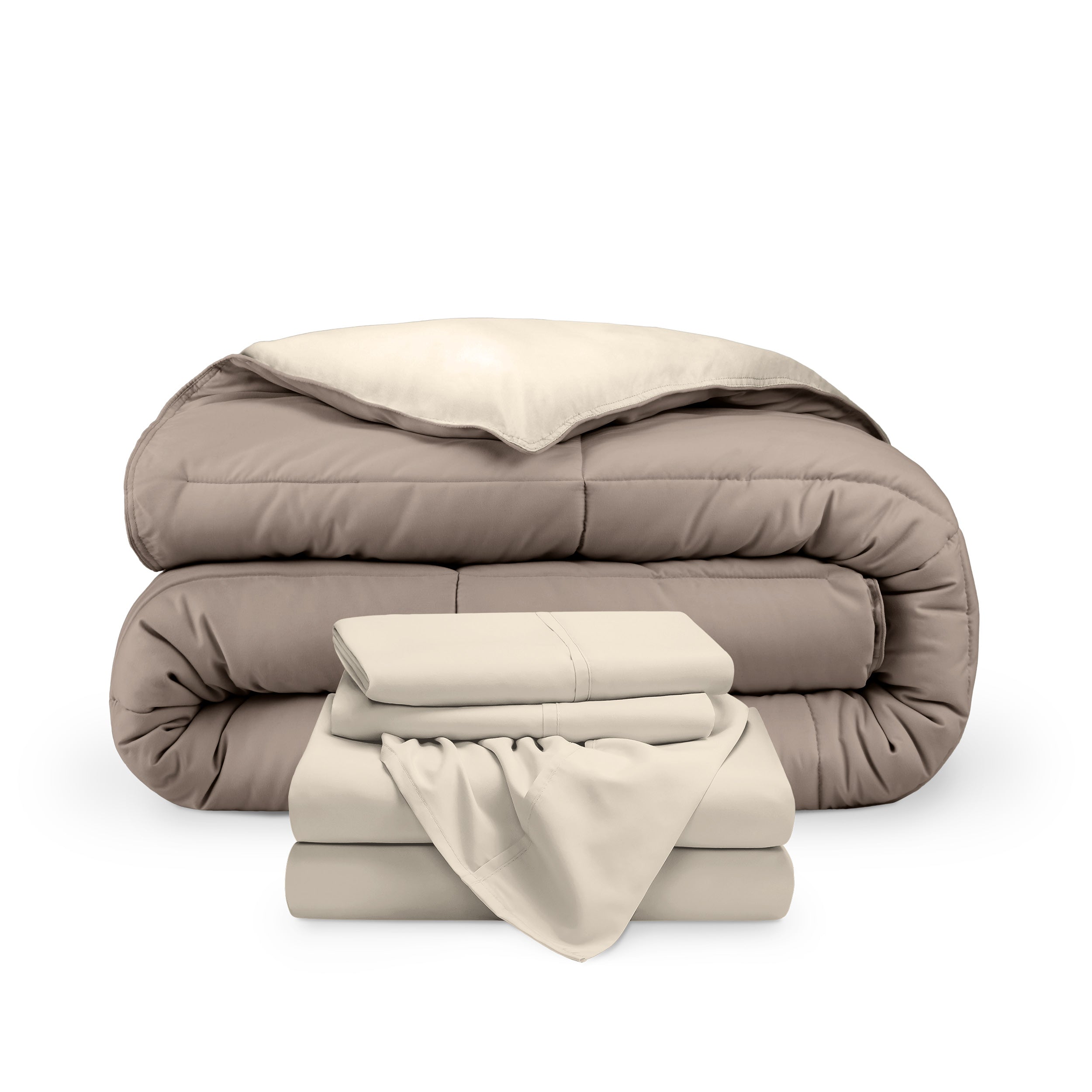 A reversible microfiber comforter and a coordinating sheet set folded and stacked