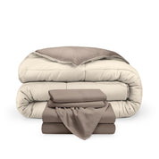 A reversible microfiber comforter and a coordinating sheet set folded and stacked