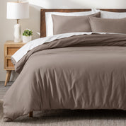 A modern bed with a flannel duvet cover set consisting of the duvet cover and two pillows.