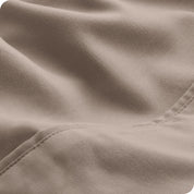 Close-up of the fabric and its neatly finished edge.