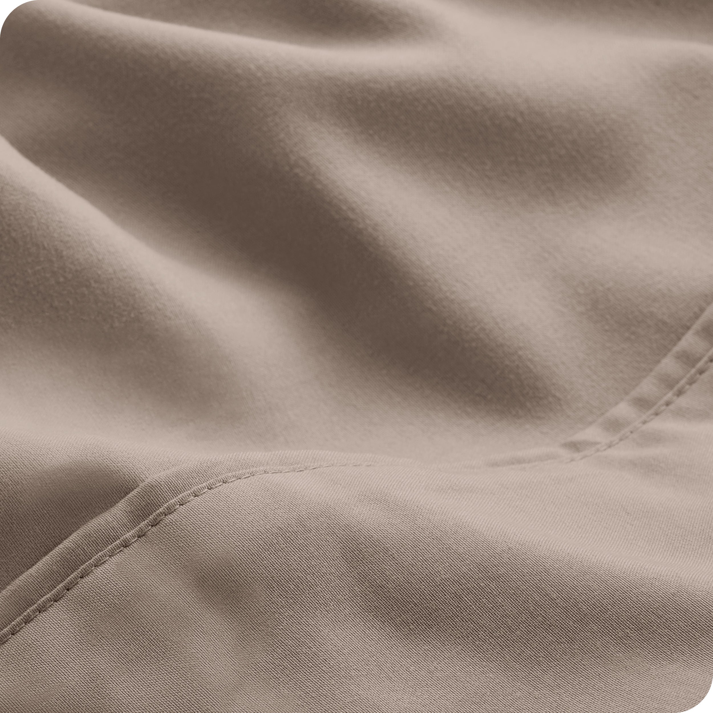 Close-up of the fabric and its neatly finished edge.