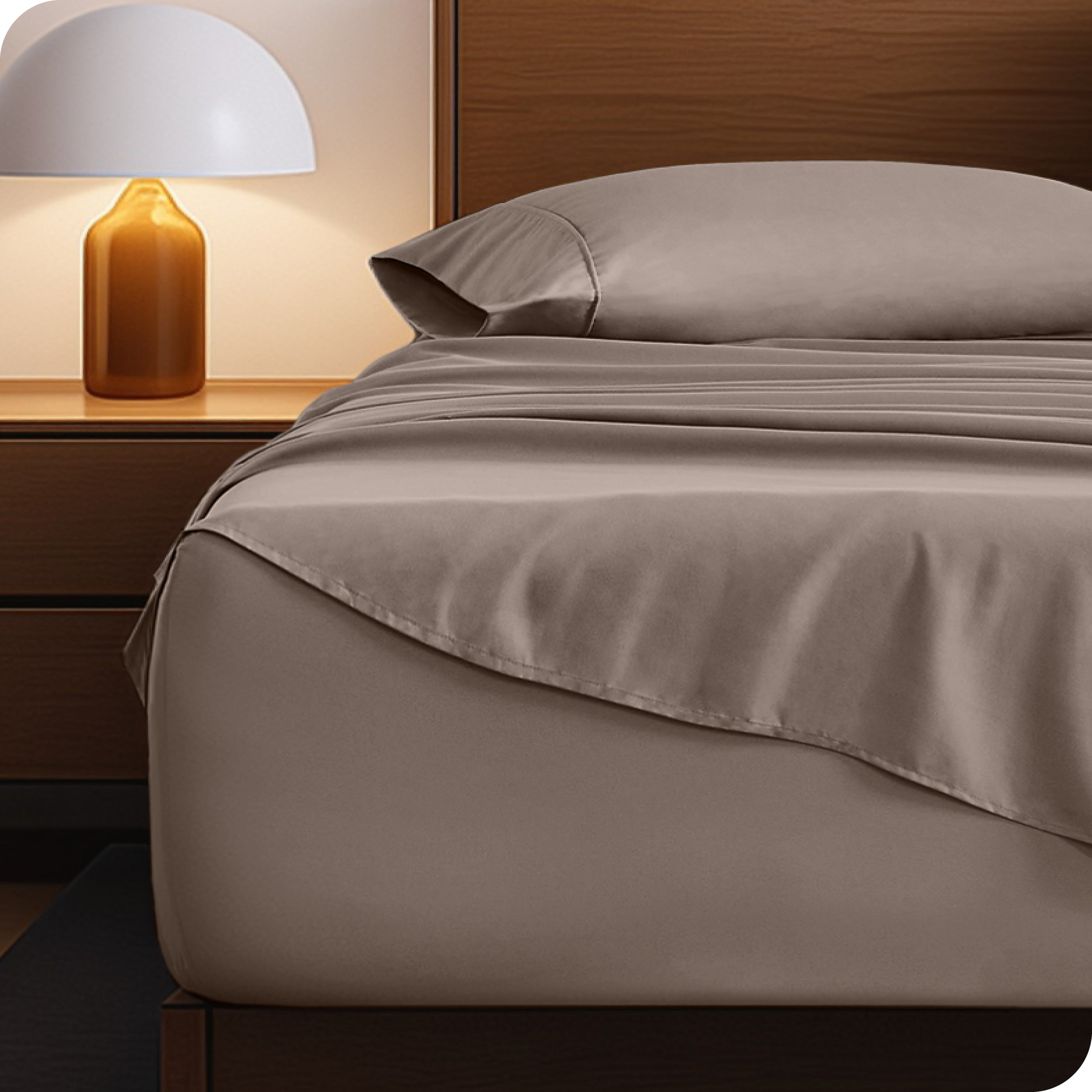 A cozy bedroom with a bed covered in soft microfiber sheets
