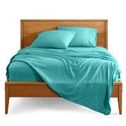 Microfiber sheet set on a bed with a wooden bed frame