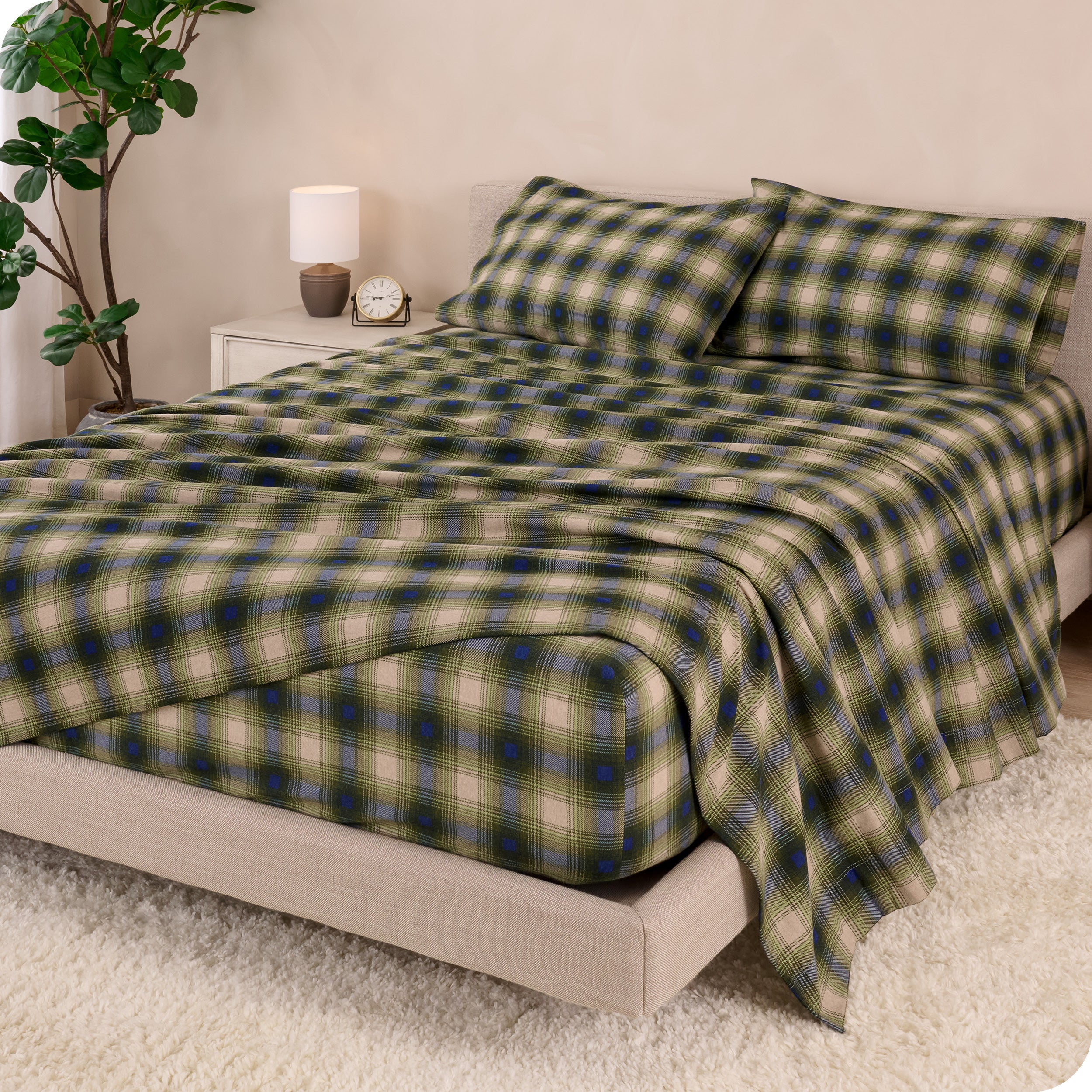A bed made with cotton flannel sheets