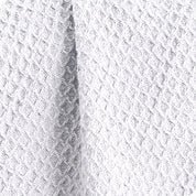 Close up of the texture of the waffle blanket