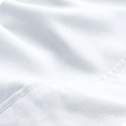 Close-up of the fabric and its neatly finished edge.