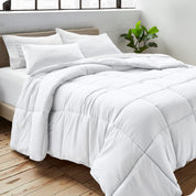 A duvet insert on a bed