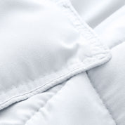 A close up of a corner of the microfiber comforter