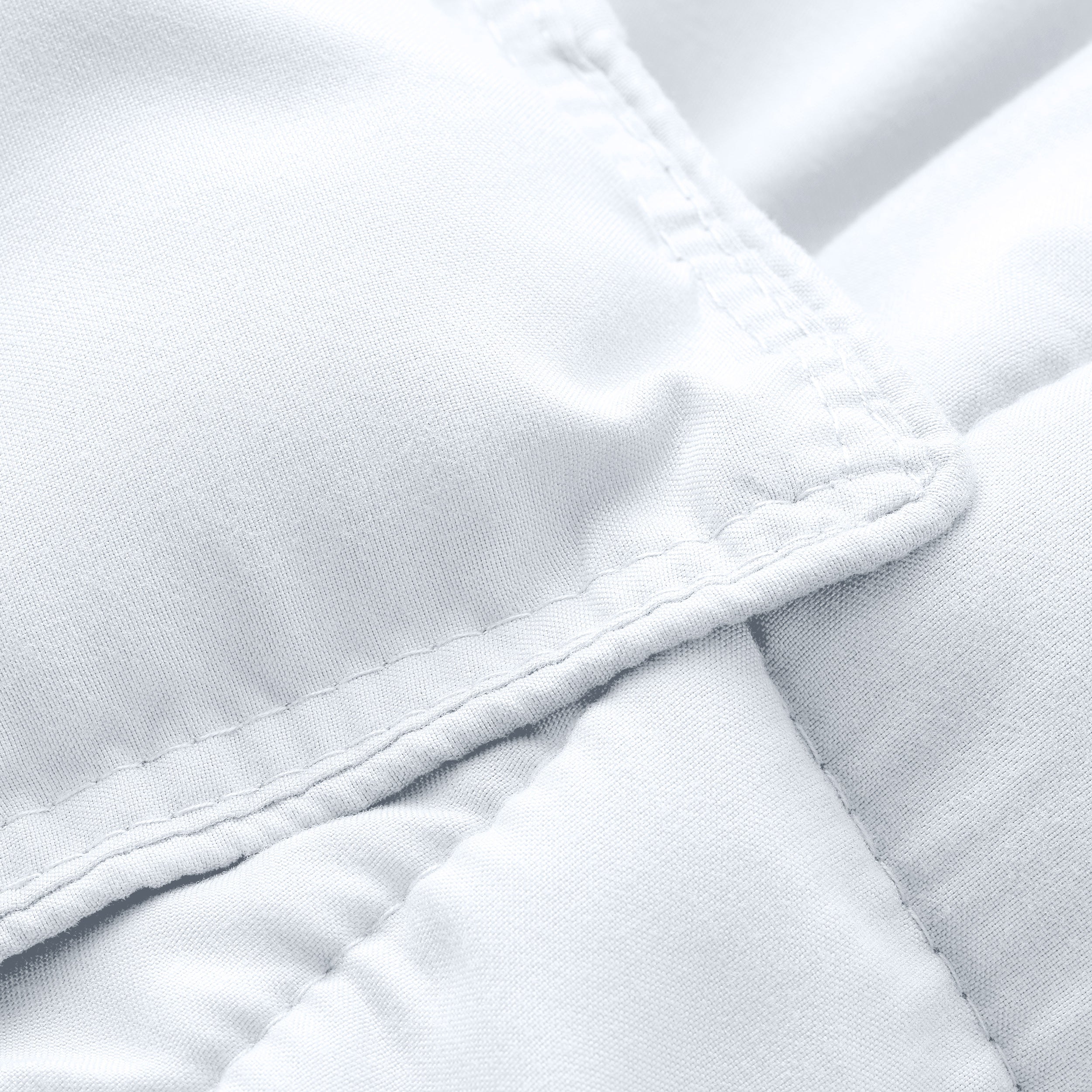 A close up of a corner of the microfiber comforter