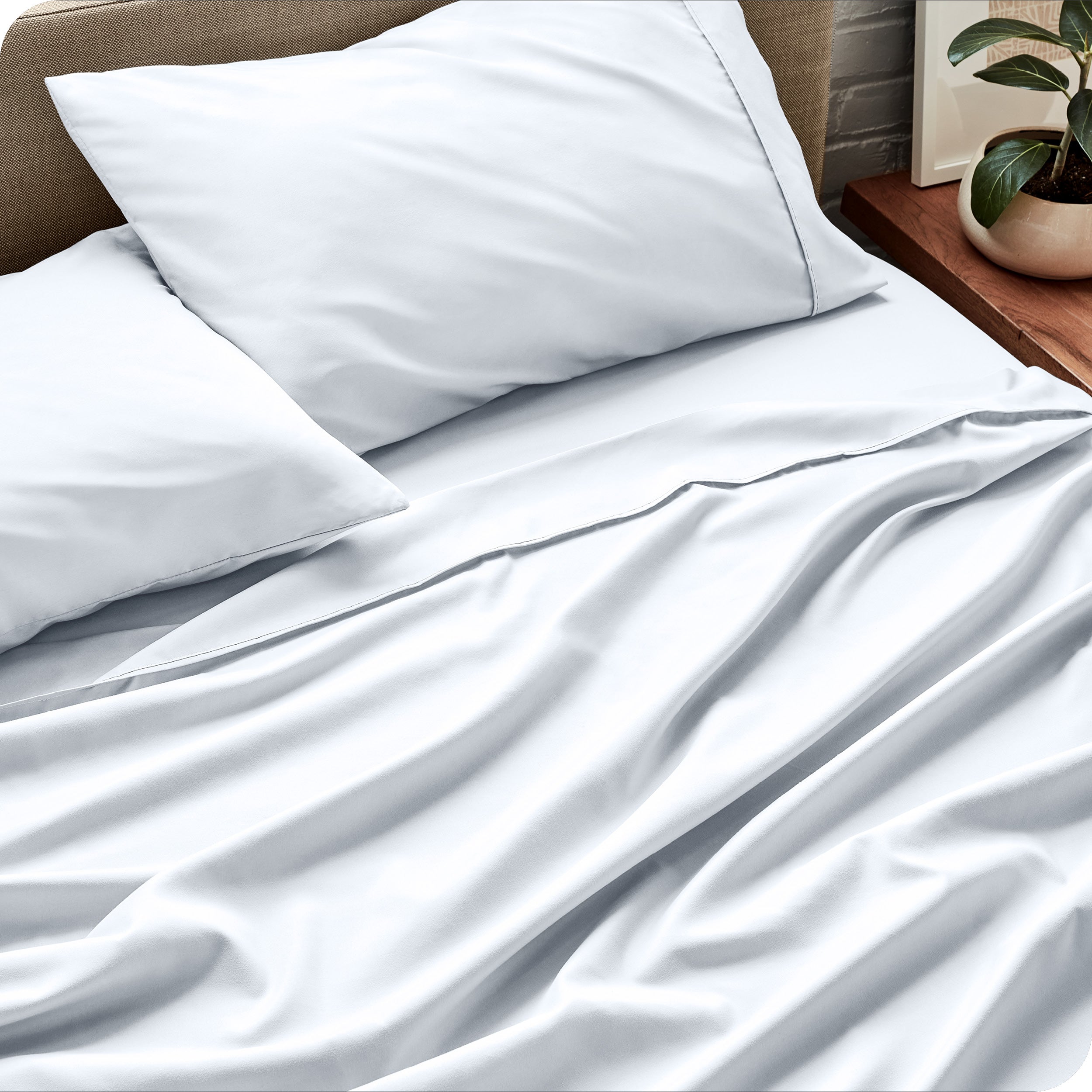 Close up of a microfiber sheet set on a bed