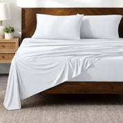 Microfiber stretch sheets on a bed