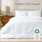 A modern bed with a organic cotton percale duvet cover on, it's Certified GOTS Organic.