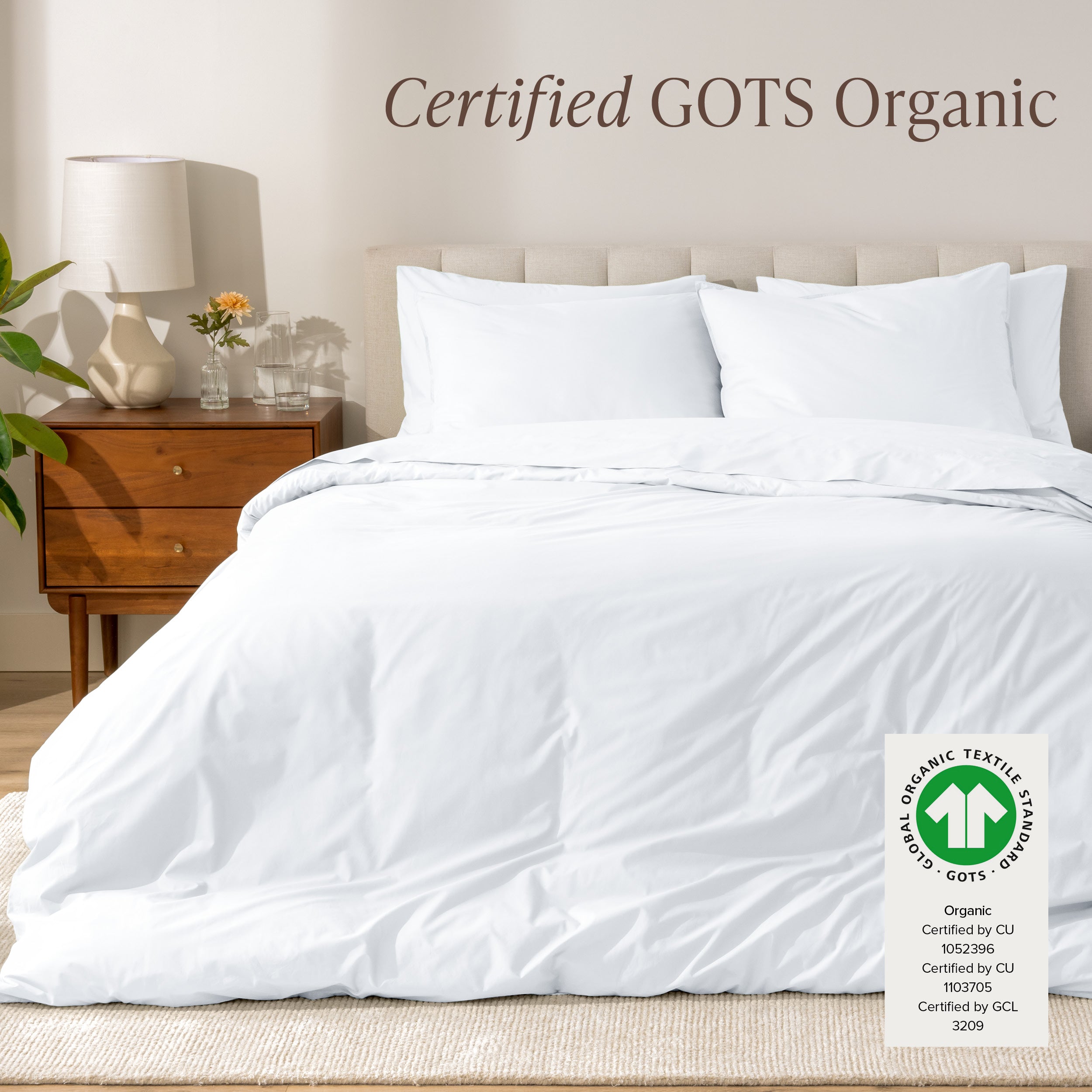 A modern bed with a organic cotton percale duvet cover on, it's Certified GOTS Organic.