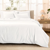 Warm bright room scene showing Sateen Duvet Set  laid out over the bed