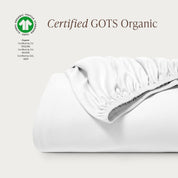 A single certified GOTS organic cotton fitted sheet folded