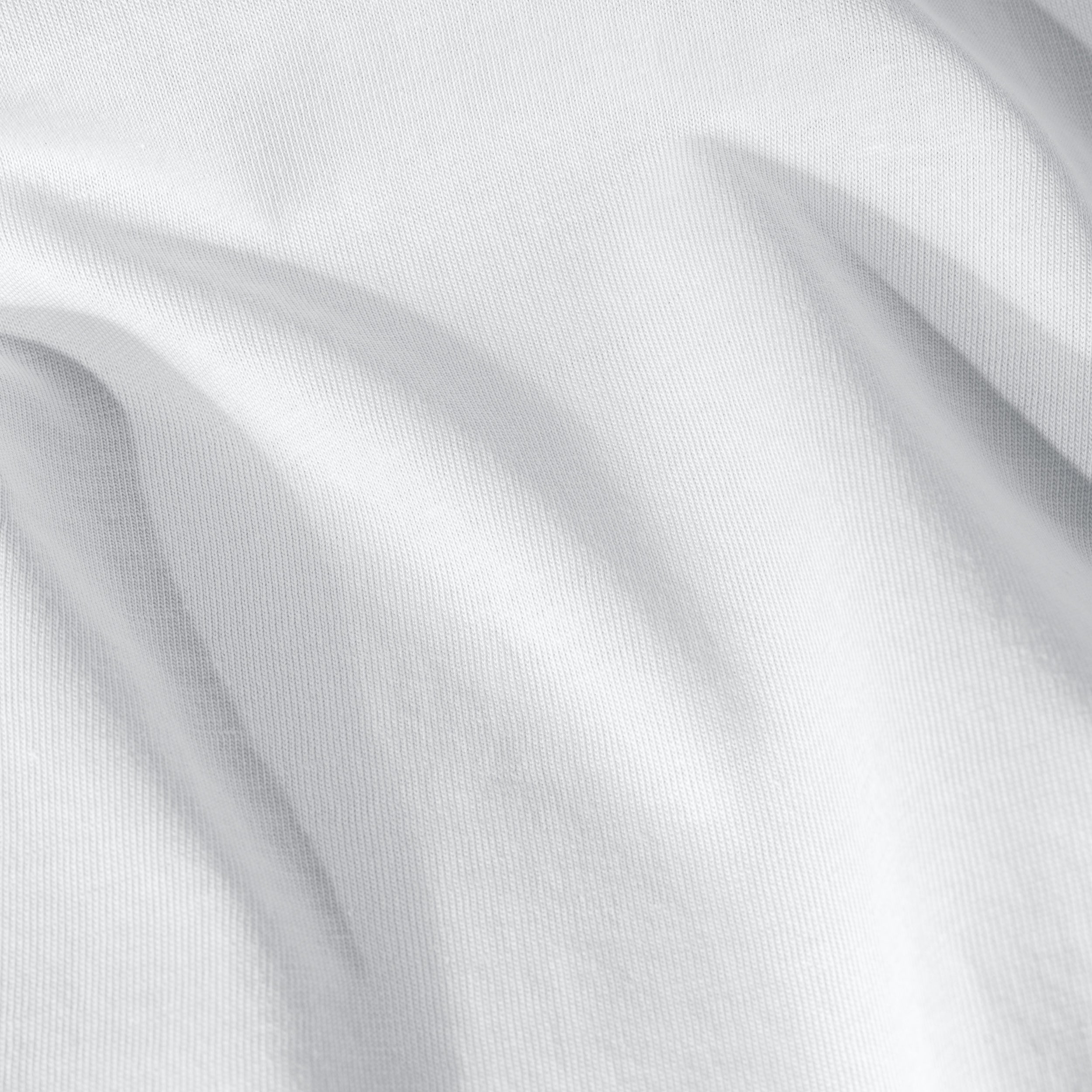 A close up view of the organic cotton jersey sheet sets' fabric and color.