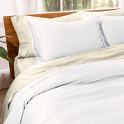 Matching TENCEL™ duvet cover and pillow shams on a bed