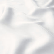 Close up of the corner ties on a TENCEL™ duvet cover