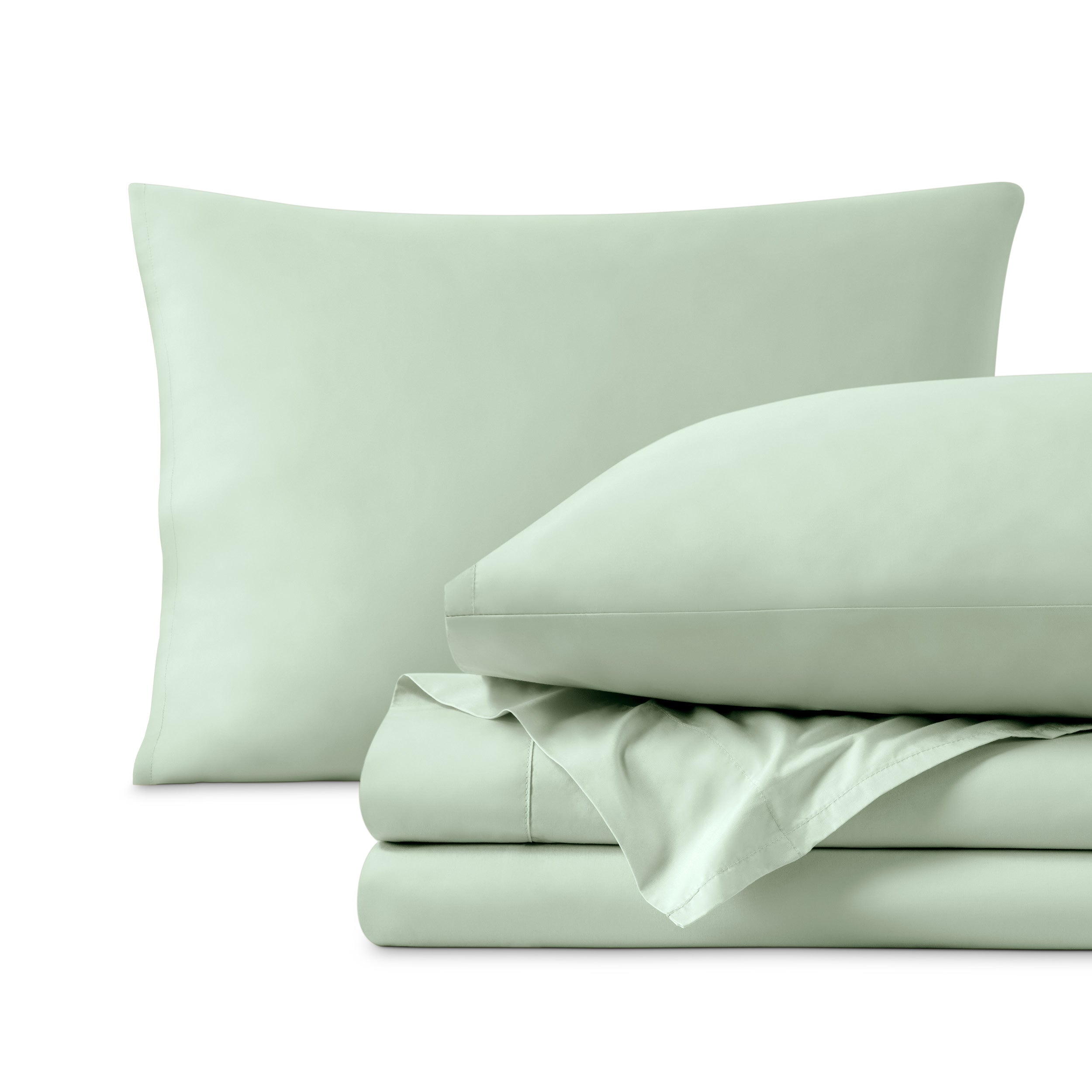 Percale sheet set with two pillows and folded sheets on a white background