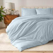 A modern bed with a organic cotton percale duvet cover on.