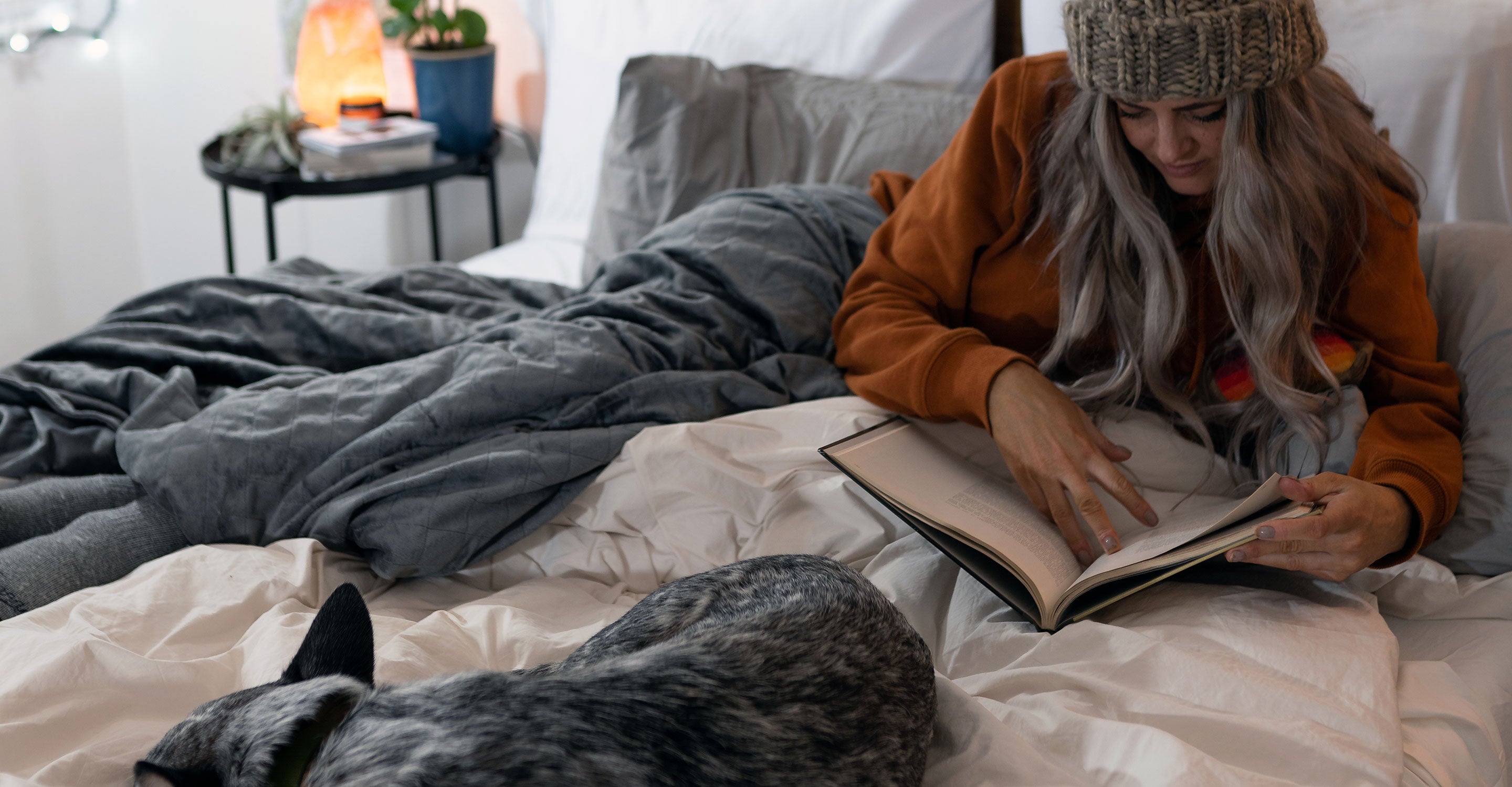 A girl reading in bed