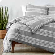 A modern bed with heathered modern plaid microfiber comforter set.