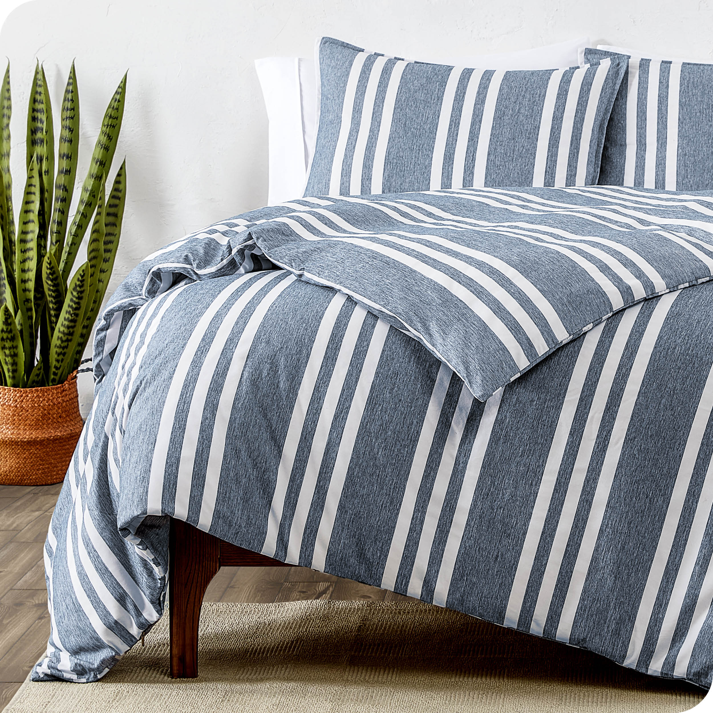 A modern bed with heathered modern plaid microfiber comforter set.