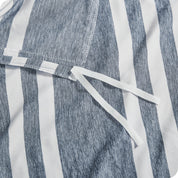 A close up view of the tie of the microfiber duvet cover.