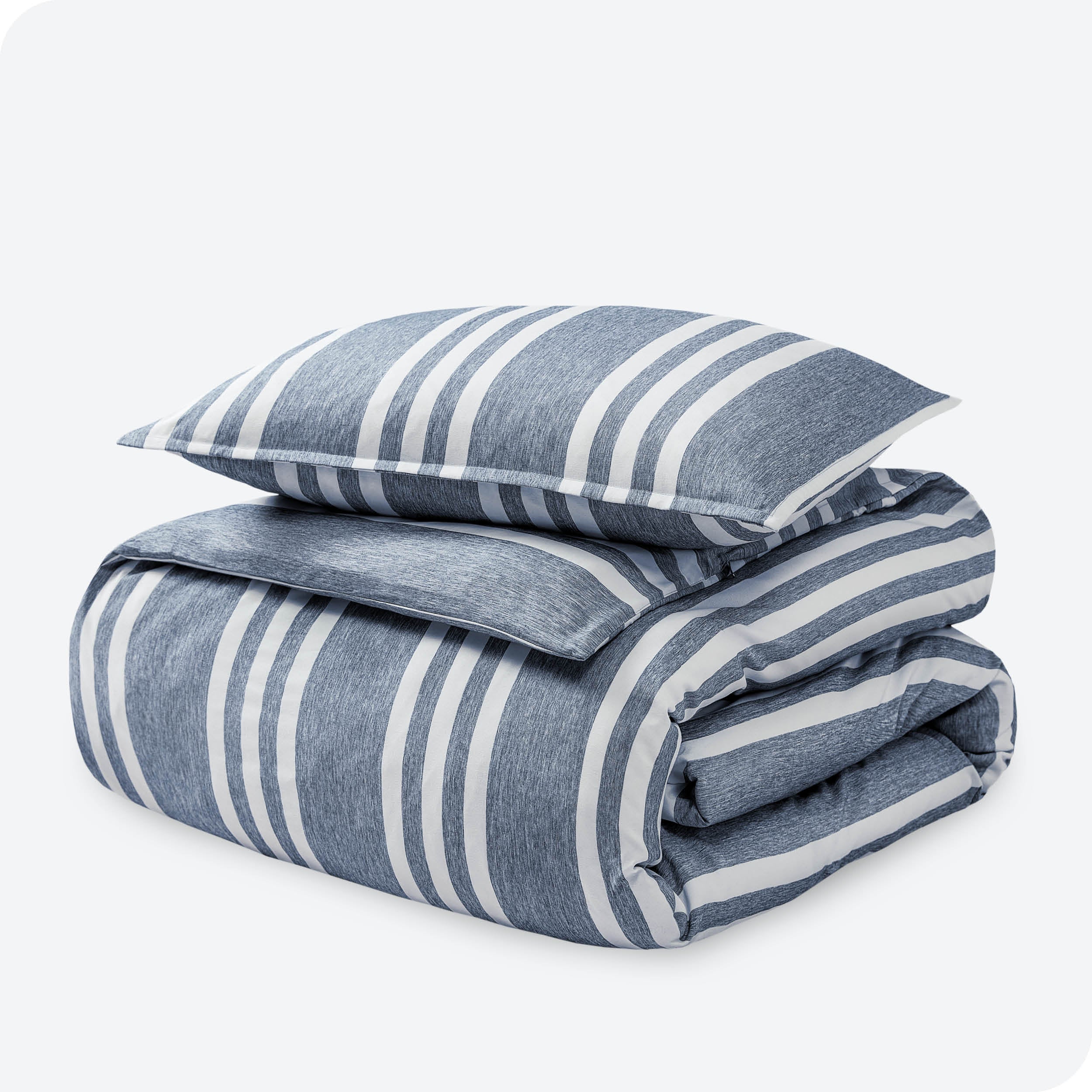 A microfiber duvet cover folded with a pillow on top.
